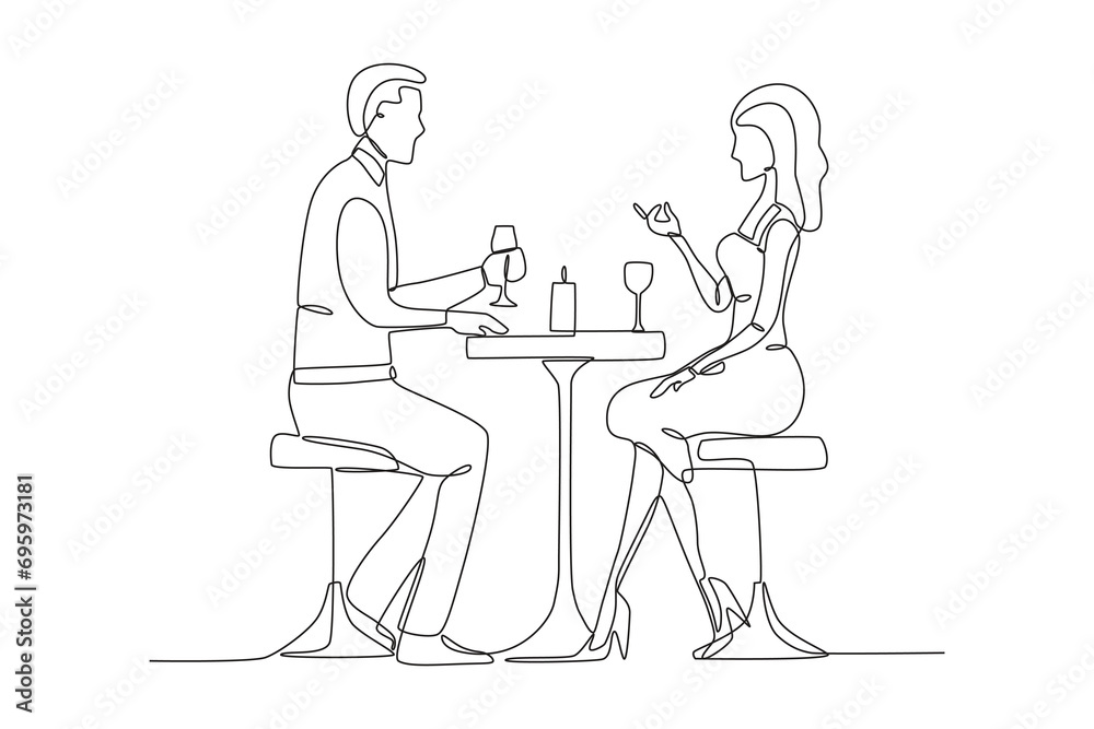 A couple having dinner at the restaurant. Candle light dinner one-line drawing