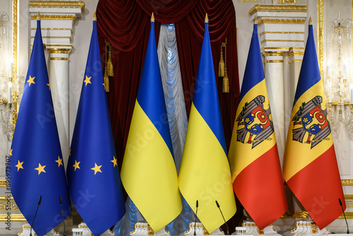 The national flags of Ukraine, Moldova and the flags of the European Union during a diplomatic event in Kyiv, Ukraine photo