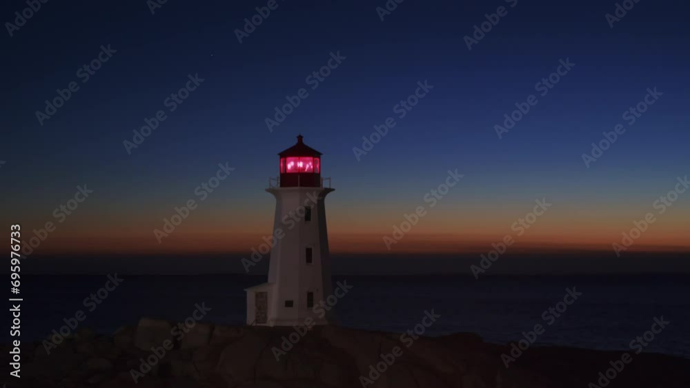Old lighthouse Peggy's Cove Lighthouse at dusk after sunset, Nova Scotia, Canada Old lighthouse Peggy's Cove Lighthouse at dusk after sunset, Nova Scotia, Canada
