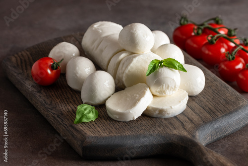 Mozzarella cheese close-up on a dark background. Side view  selective focus.