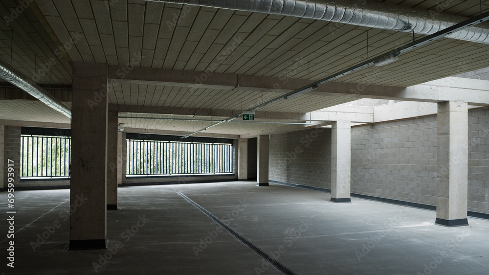 car parking without cars in a gray concrete building