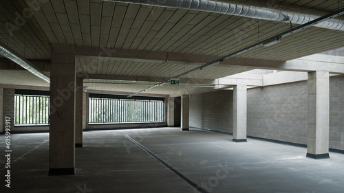 car parking without cars in a gray concrete building © fotofotofoto