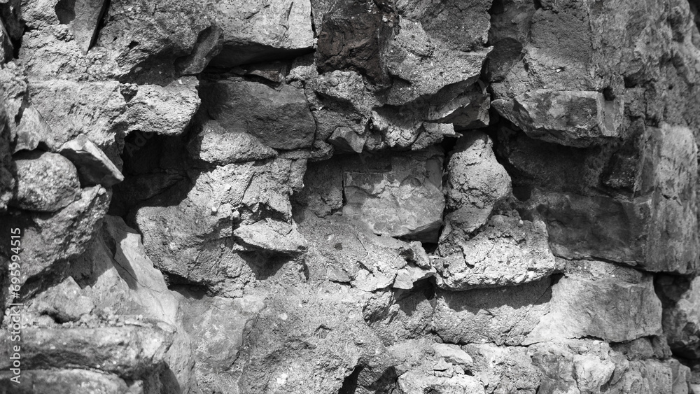 Fototapeta premium old gray stone wall closeup