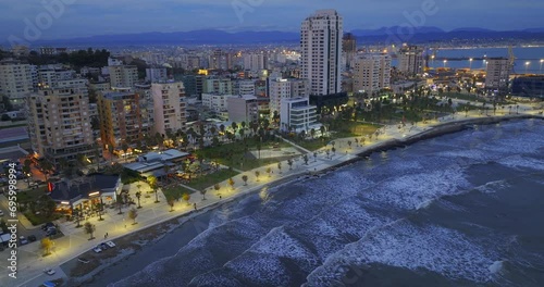Skyline of the coastal city of Durres, Albania just after the sunset.  photo