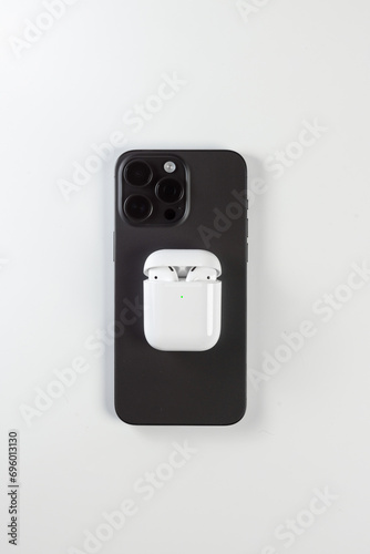 black modern smartphone with camera loss on white background