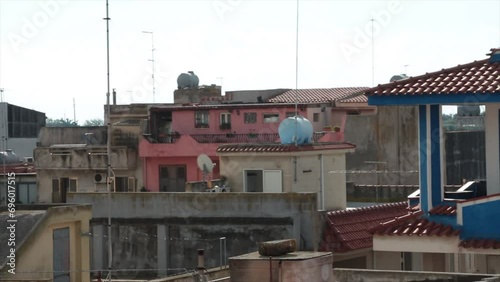 pachino sicily italy street buildings homes houses rooftops shot from roof balcony medium shot with zoom in