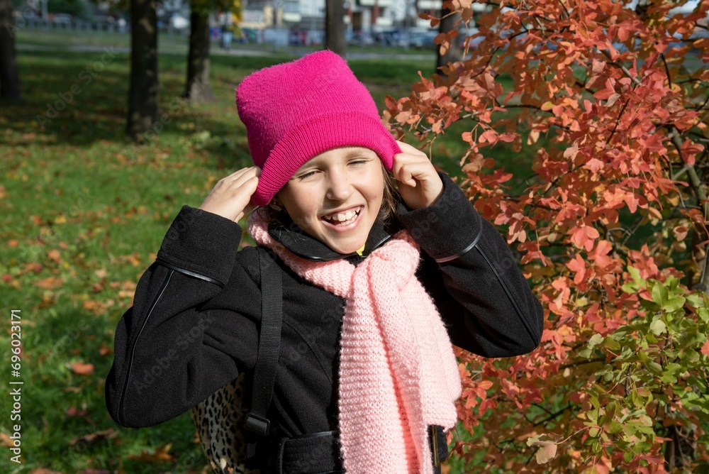 Happy child on an autumn day
