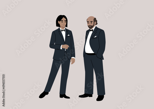 Two impeccably dressed characters engage in conversation at a black-tie event, donning elegant tuxedos photo