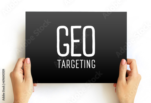 Geo Targeting - method of delivering different content to visitors based on their geolocation, text concept on card photo