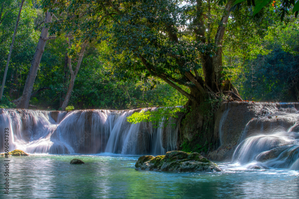 Fototapeta premium Chet Sao Noi Waterfall, or Seven Little Girls waterfall, a seven tiers of small and beautiful waterfall in Namtok Chet Sao Noi National Park, Saraburi