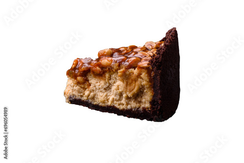 Schilderij op canvas Delicious fresh cheesecake cake or snickers with cream and nuts