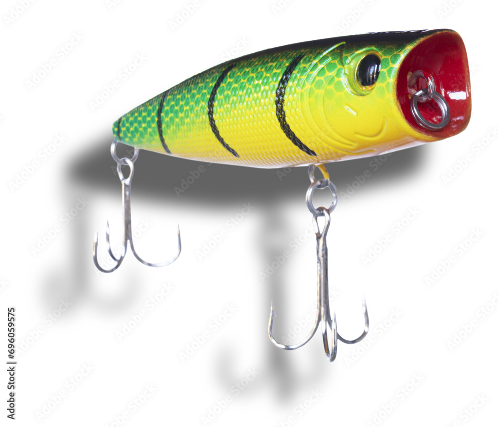 Shadow below a big arficial topwater fishing bait with two treble hooks Shadow below a big arficial topwater fishing bait with two treble hooks