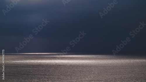 Sunlight Break Through Clouds Over Atlantic Ocean
