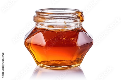 Glass jar with sweet honey. Honey jar isolated on white. 