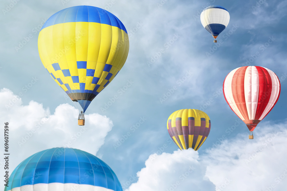 Fototapeta premium Many bright hot air balloons flying in sky