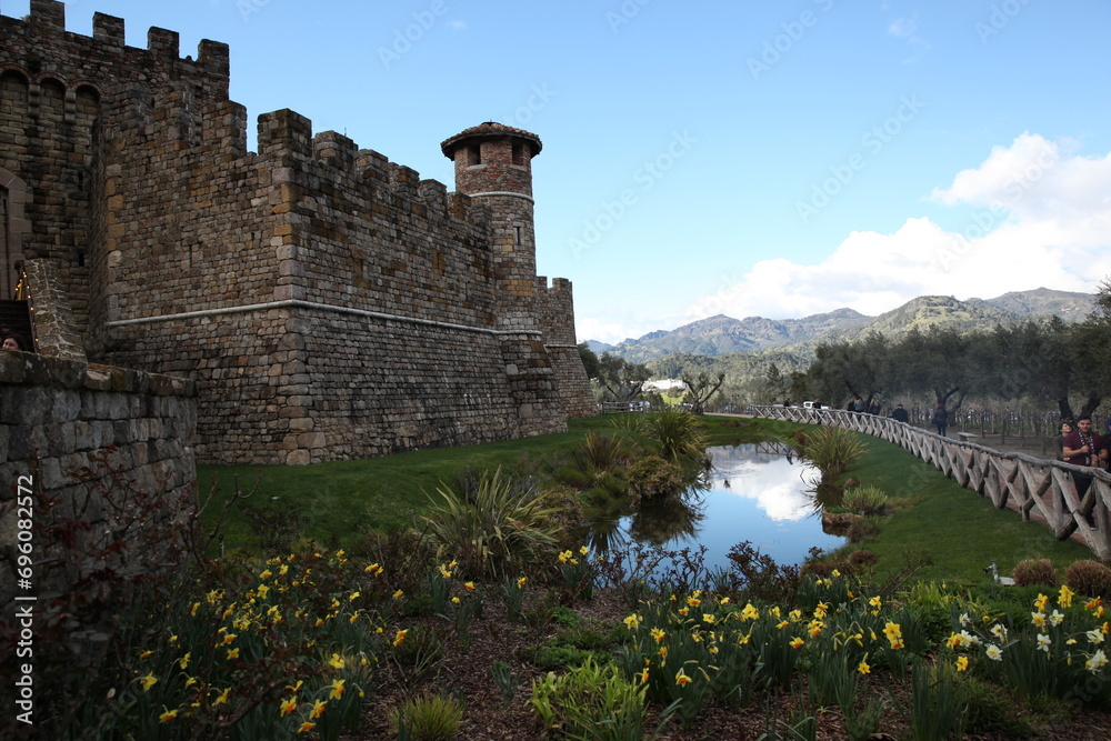 Fototapeta premium Castle Tower with Stream and Mountainside