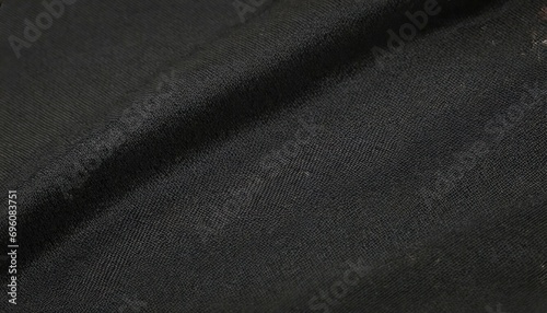 black flag cloth in full frame with selective focus 3d of pitch dark colored garment with clean natural linen texture for background banner or wallpaper use