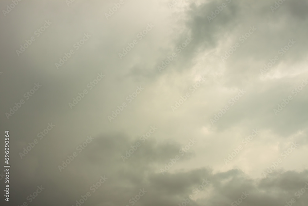 Foggy dramatic sky after the storm with misty clouds and moody mysterious atmosphere Foggy dramatic sky after the storm with misty clouds and moody mysterious atmosphere