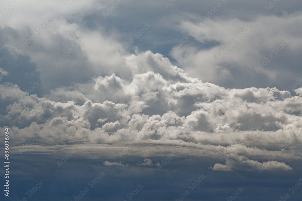 Cumulus clouds in the blue sky, cloud formation.