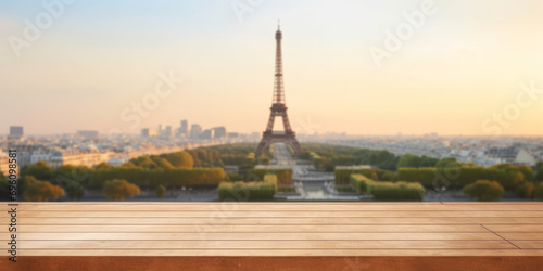 Empty wooden table for product display with France, Paris city skyline and Eiffel Tower background photo