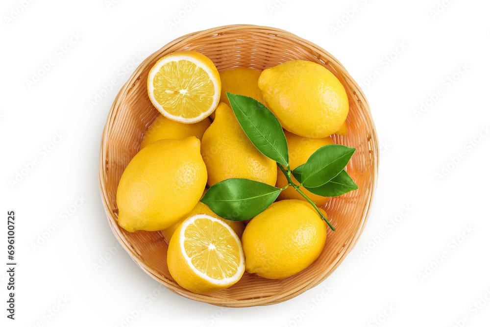 Ripe lemons in wicker basket isolated on white background. Top view. Flat lay. Ripe lemons in wicker basket isolated on white background. Top view. Flat lay.