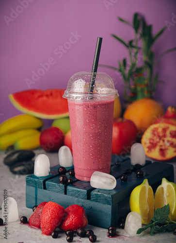 A selection of juices with natural fruits, milkshakes, dessert, pineapple, strawberry and pomegranate