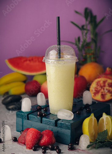 A selection of juices with natural fruits, milkshakes, dessert, pineapple, strawberry and pomegranate