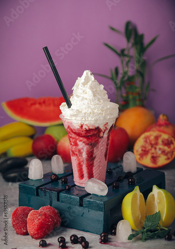 A selection of juices with natural fruits, milkshakes, dessert, pineapple, strawberry and pomegranate
