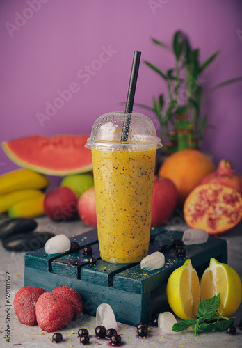 A selection of juices with natural fruits, milkshakes, dessert, pineapple, strawberry and pomegranate