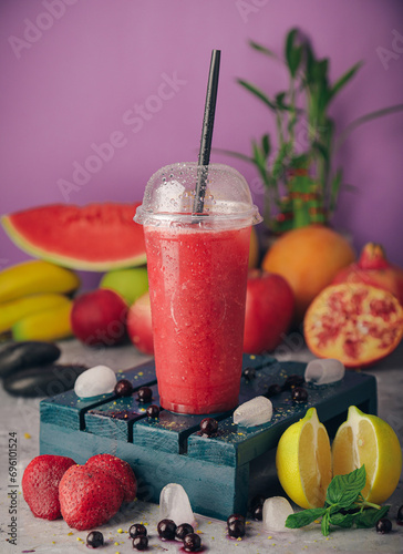 A selection of juices with natural fruits, milkshakes, dessert, pineapple, strawberry and pomegranate