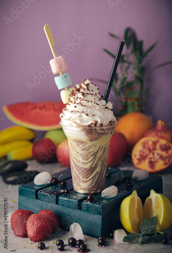 A selection of juices with natural fruits, milkshakes, dessert, pineapple, strawberry and pomegranate