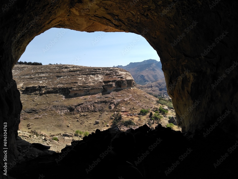 Outlook from a cave overlooking mountains in Lesotho