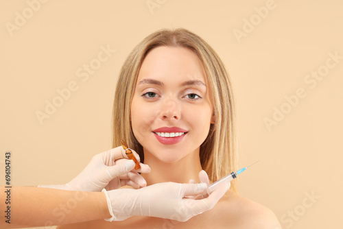 Young woman receiving fille...