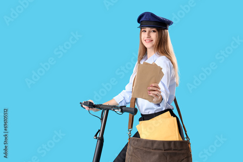 Young postwoman with letter...