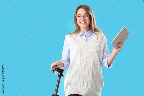 Young businesswoman with ta...