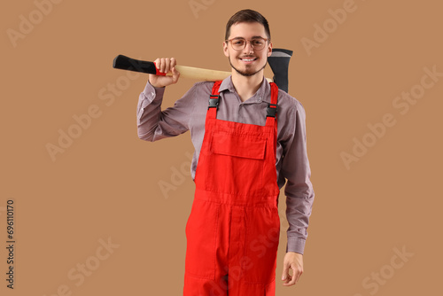 Young male worker in eyegla...