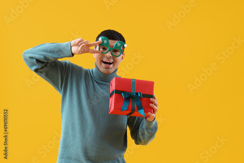 Young man with Christmas gi...