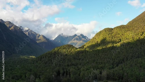 Aerial landing over Te Anau highway in Milford Sound of New Zealand as 4k.
 photo