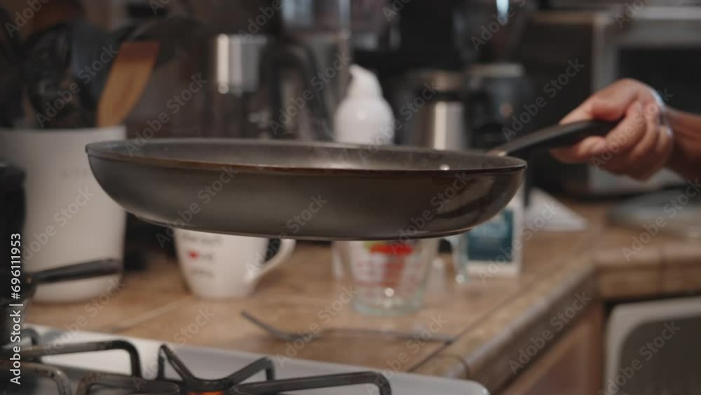 Slow-Mo Elegance as a Black Woman Infuses Culinary Magic, Frying Diced Red Bell Peppers in a Pan with Exquisite Precision Slow-Mo Elegance as a Black Woman Infuses Culinary Magic, Frying Diced Red Bell Peppers in a Pan with Exquisite Precision