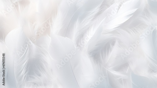 Soft white feathers creating a delicate and fluffy texture © Artyom