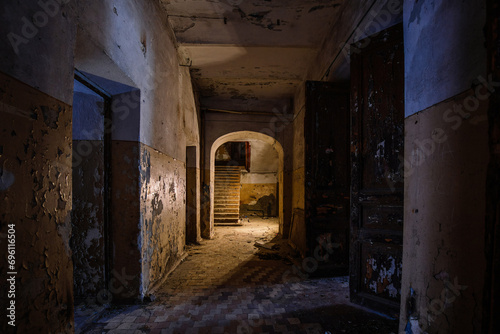 Dark creepy vaulted corridor in old abandoned building © Mulderphoto