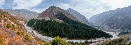 Panorama, view into the Ala Archa valley, autumnal mountain landscape with mountain stream Ak Say and Ala Archa, Ala Archa National Park, Khirgiz Ala-Too Mountains, Chuy Region, Kyrgyzstan, Asia photo