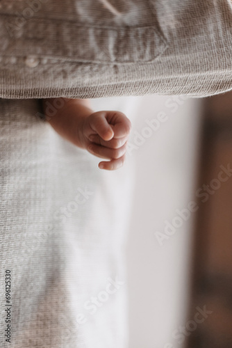 small child's hand clenched into a fist