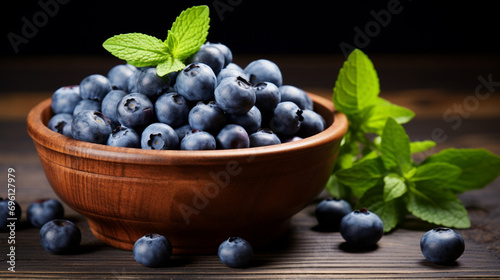 Freshly picked blueberries in wooden bowl. Juicy and fresh blueberries green leaves. generative ai