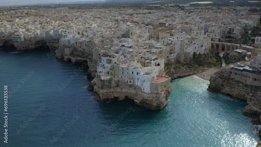 Drone aerial view of Polignano a Mare iconic beach and white ...