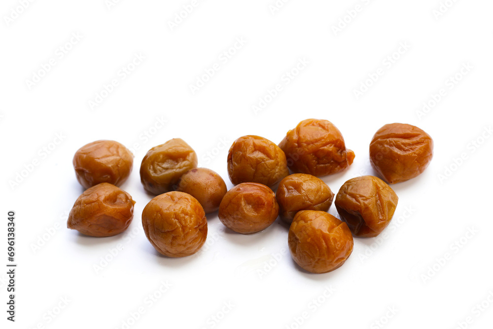 Pickled plums on white background.