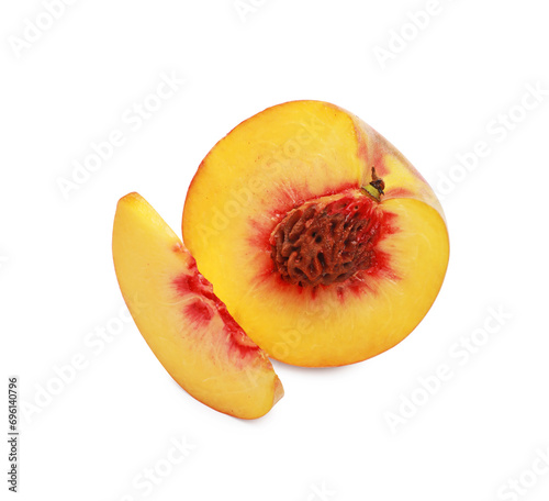 Delicious cut ripe peach isolated on white