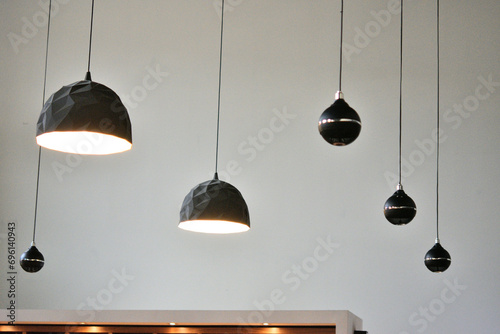 Beautiful hanging lamps in modern interior photo