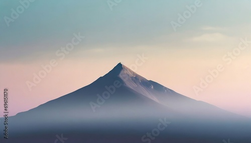 Majestic mountain peak rising above mist with a soft gradient sky backdrop, serene and minimalist landscape.