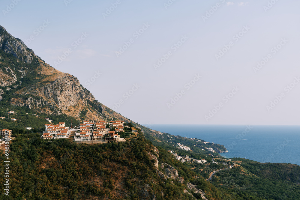 Russian village for the rich on the mountain above the island of Sveti Stefan. Montenegro
